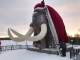 На Ямале статую мамонта одели в костюм Деда Мороза